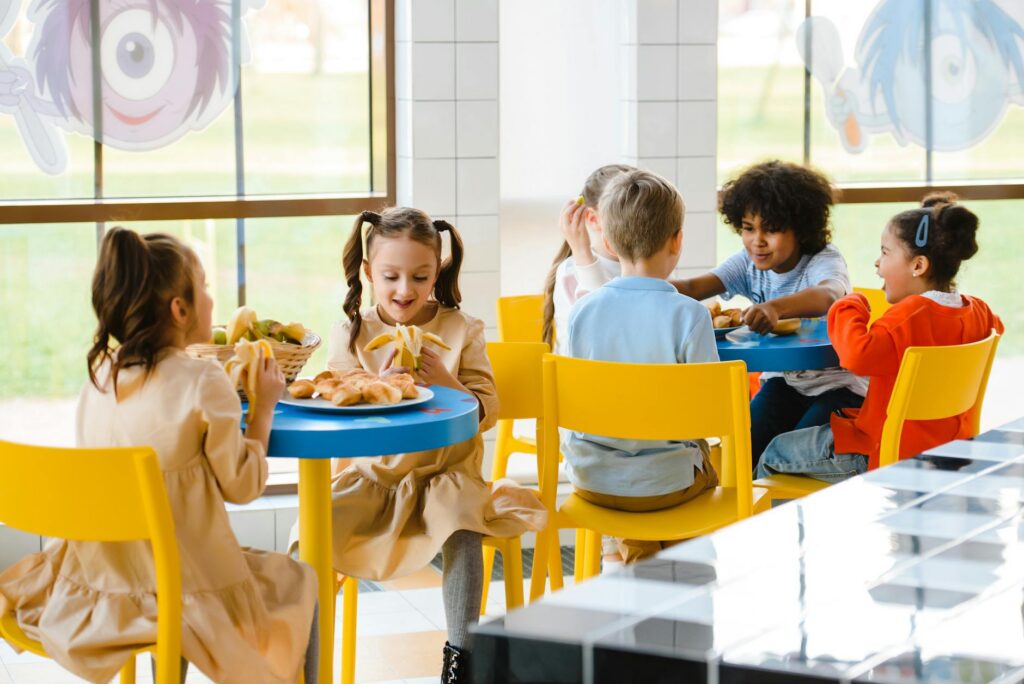 children eating in a canteen